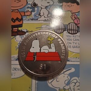 Peanuts 65th Anniversary Silver Coin $1.00 British Pobjoy Mint. In Package.